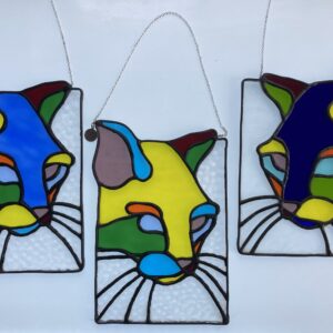Multi coloured cat in panel