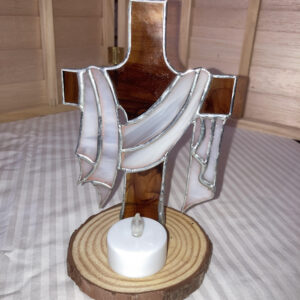 Easter cross with white drape on wooden base